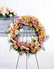 Vibrant Sympathy Wreath from Olney's Flowers of Rome in Rome, NY